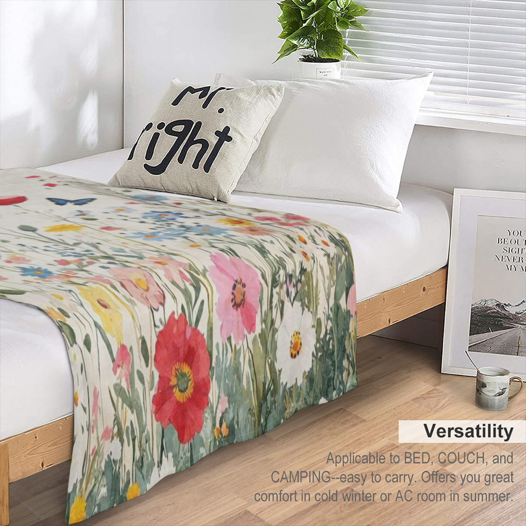 A modern floral and butterfly patterned flannel blanket - tear resistant, knitted fabric for all seasons, perfect for home, office, outdoors, beach, camping - digitally printed polyester decorative bl
