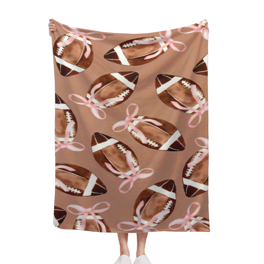 Cozy Pink Bow-Tied Football Print Throw Blanket - Soft, Reversible Flannel for All Seasons - Perfect for Bed, Sofa, Camping & Travel